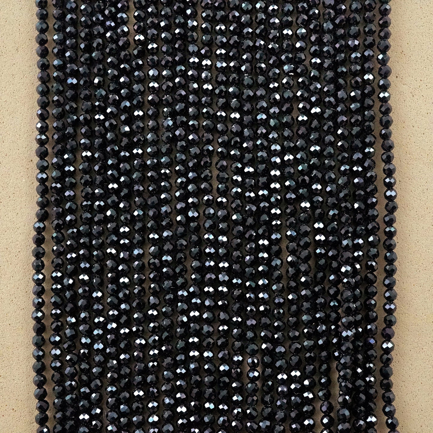 Black Spinel (Round)(Micro)(Faceted)(2mm)(15"Strand)