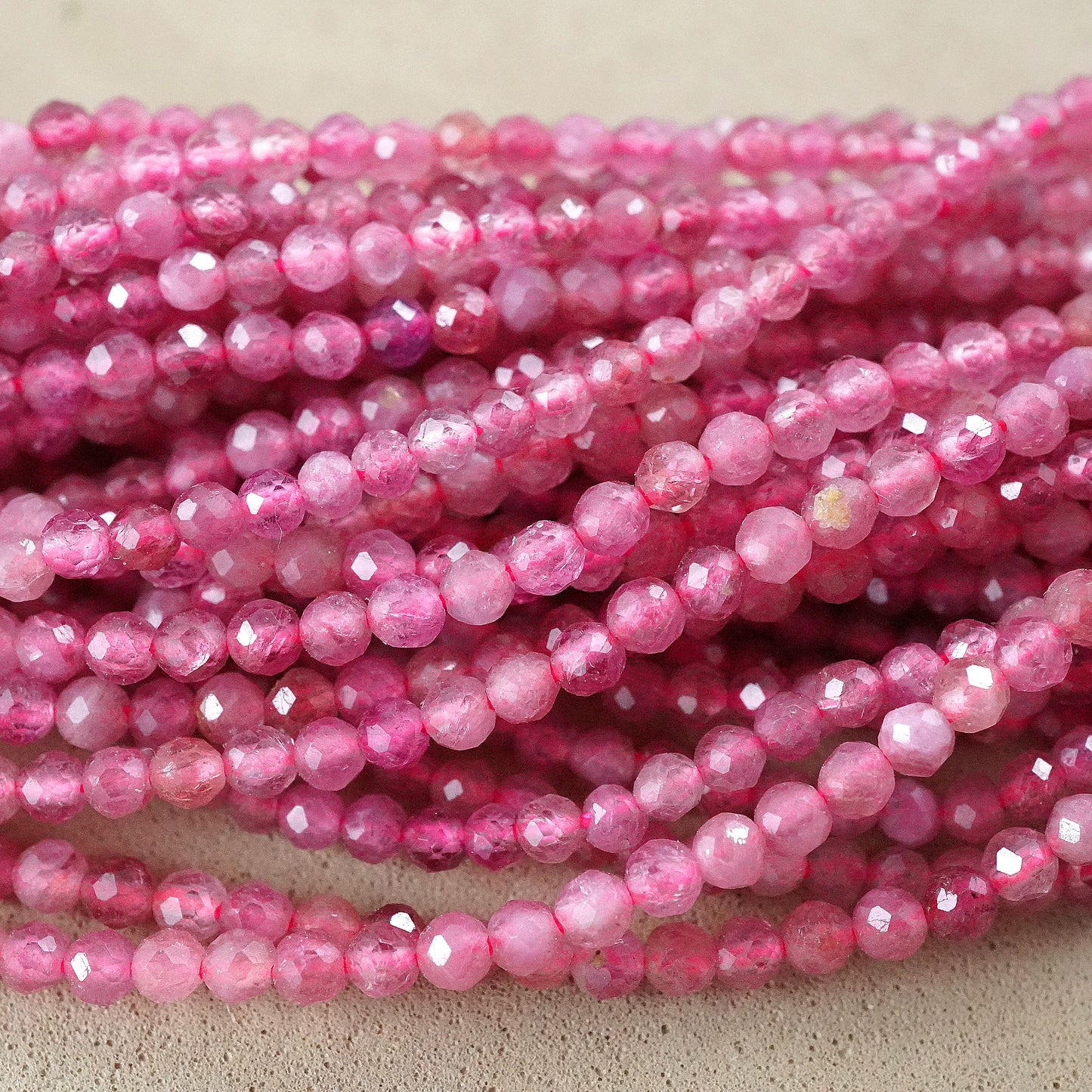 Pink Tourmaline (Round)(Micro)(Faceted)(2mm)(15"Strand)