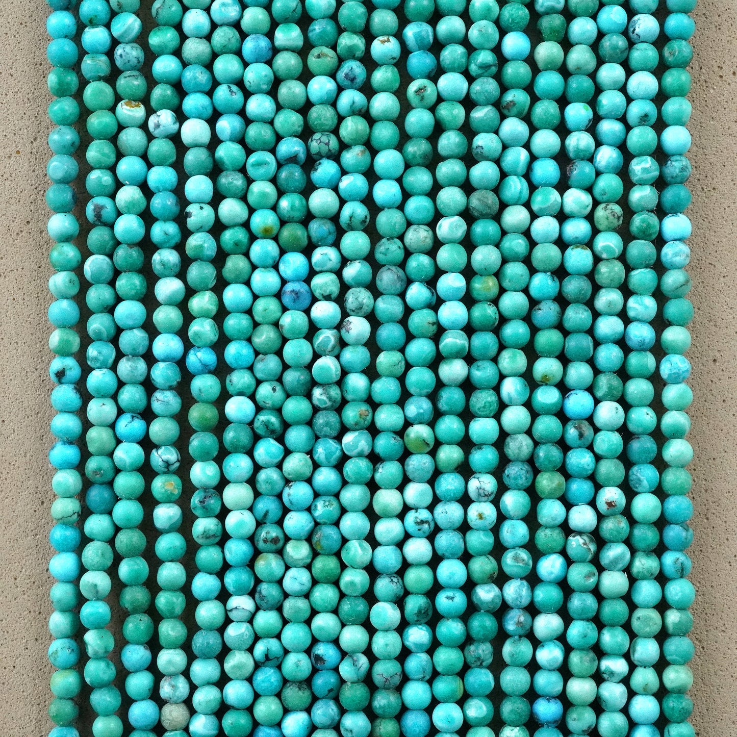 Turquoise (Round)(Smooth)(High Grade)(2mm)(15"Strand)