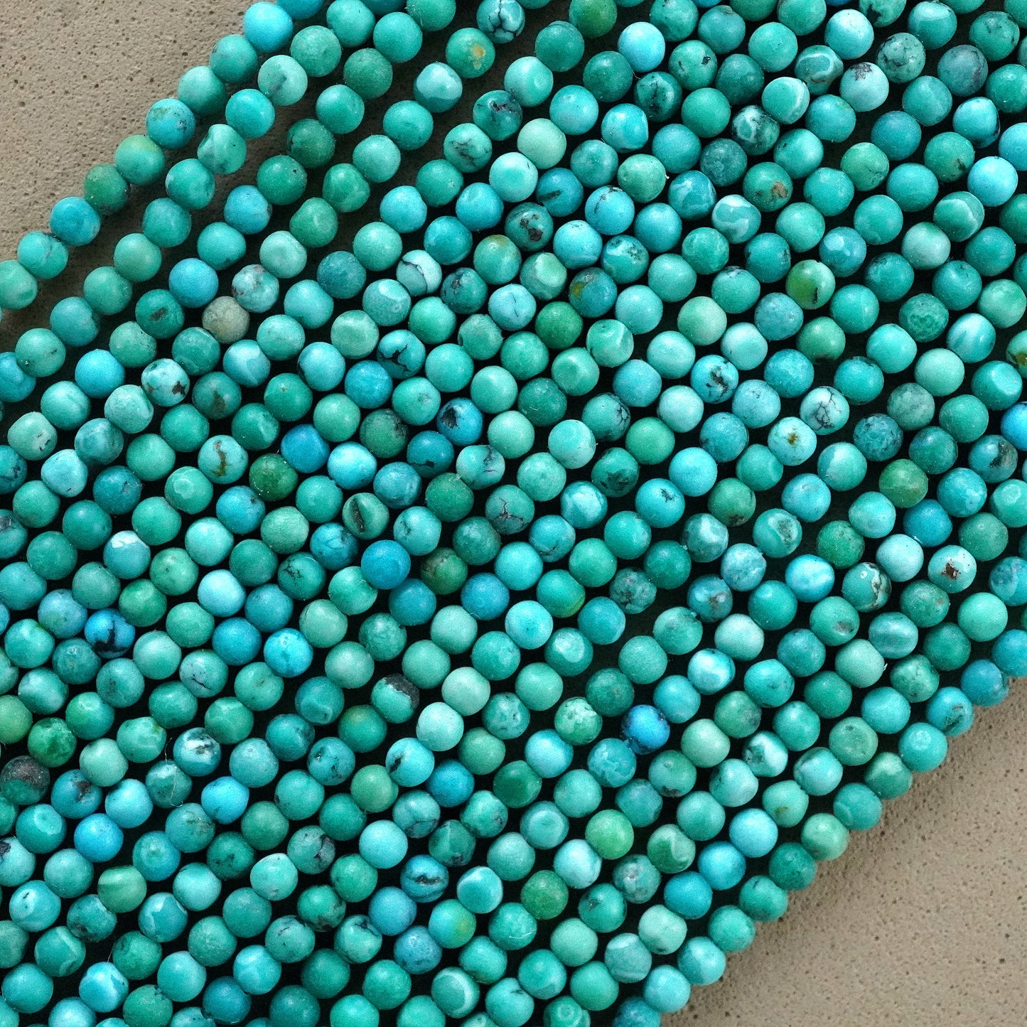 Turquoise (Round)(Smooth)(High Grade)(2mm)(15"Strand)