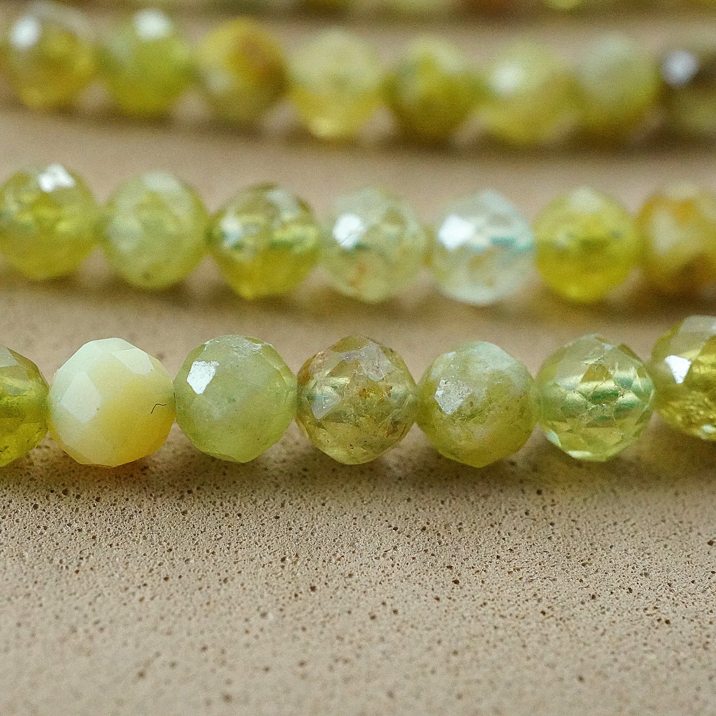 Green Garnet (AA)(Round)(Micro)(Faceted)(4mm)(15"Strand)