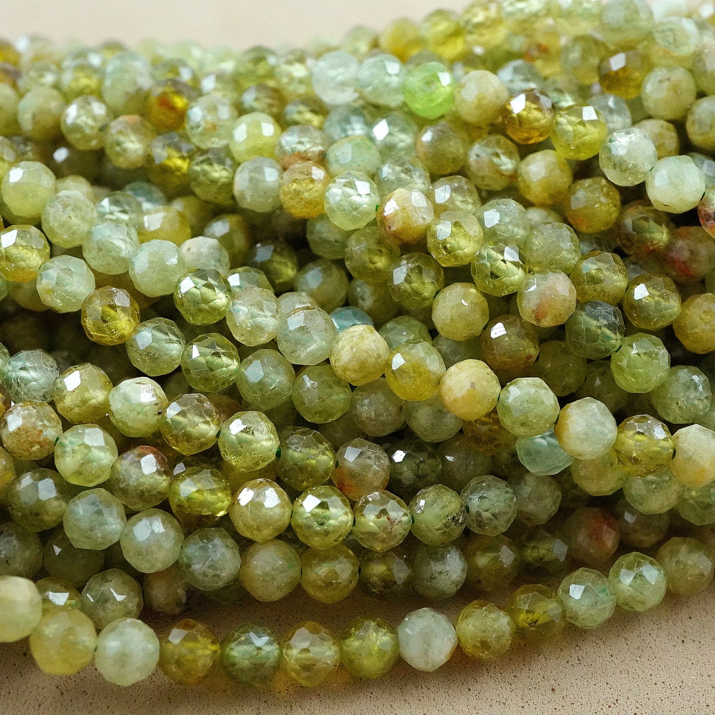 Green Garnet (AA)(Round)(Micro)(Faceted)(4mm)(15"Strand)