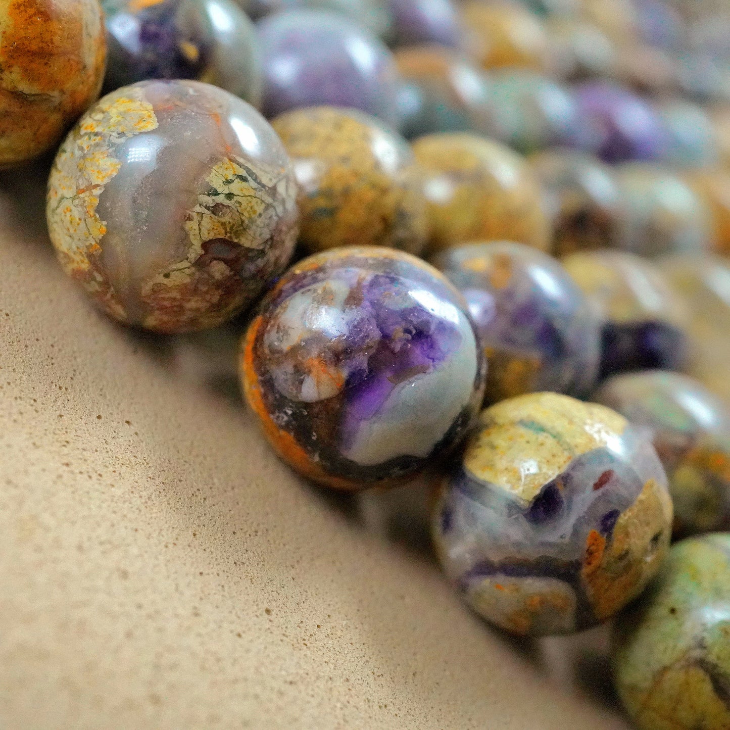 Purple Brecciated Jasper (Round)(Smooth)(6mm)(8mm)(10mm)(15"Strand)