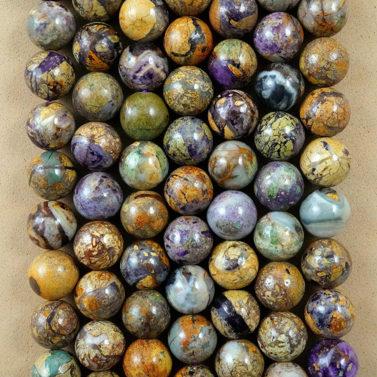 Purple Brecciated Jasper (Round)(Smooth)(6mm)(8mm)(10mm)(15"Strand)