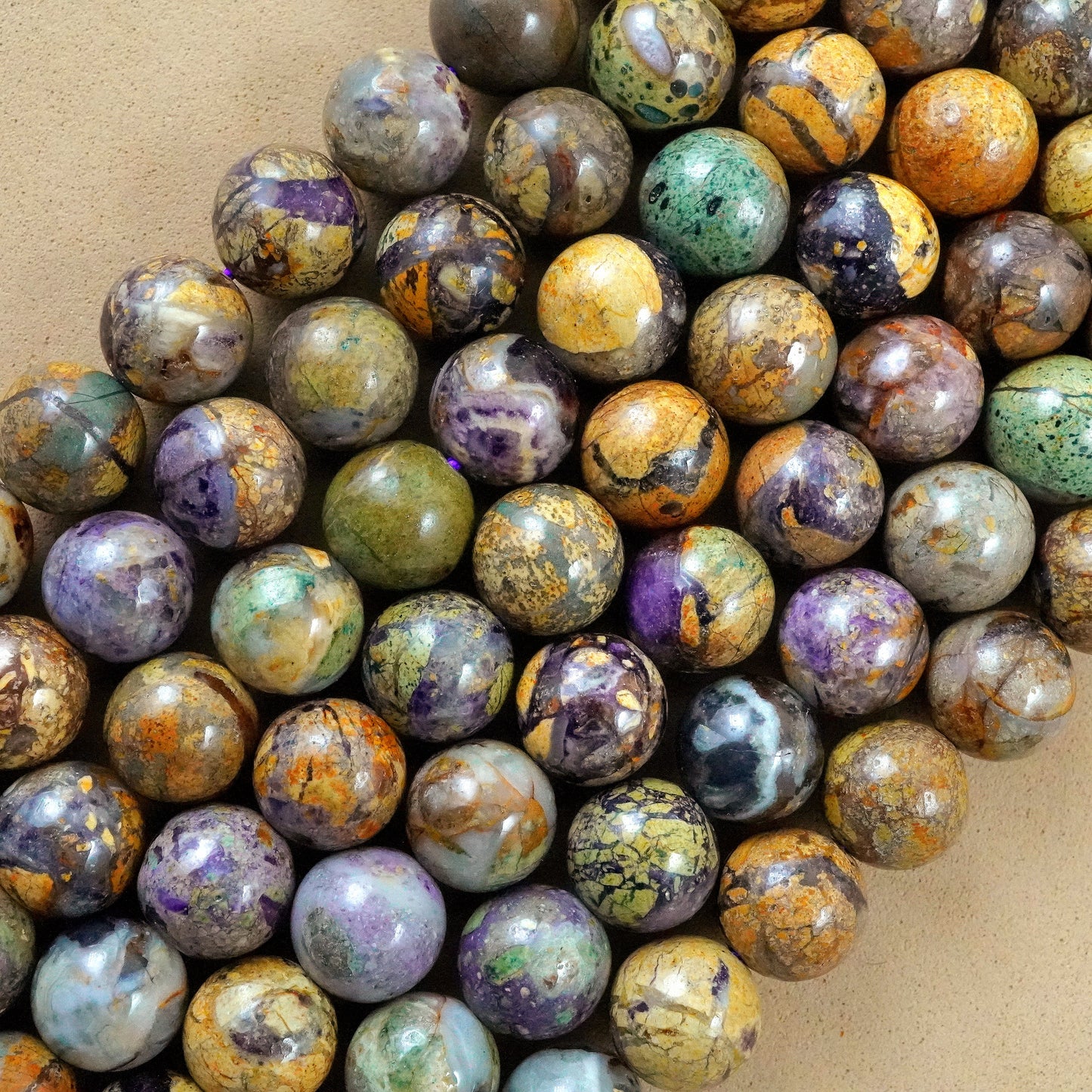 Purple Brecciated Jasper (Round)(Smooth)(6mm)(8mm)(10mm)(15"Strand)