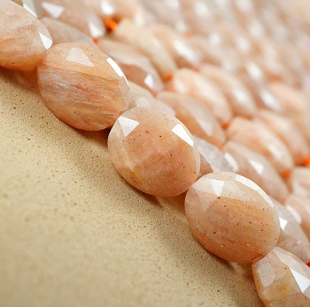Peach Moonstone (Oval)(Faceted)(8x10mm)(15"Strand)