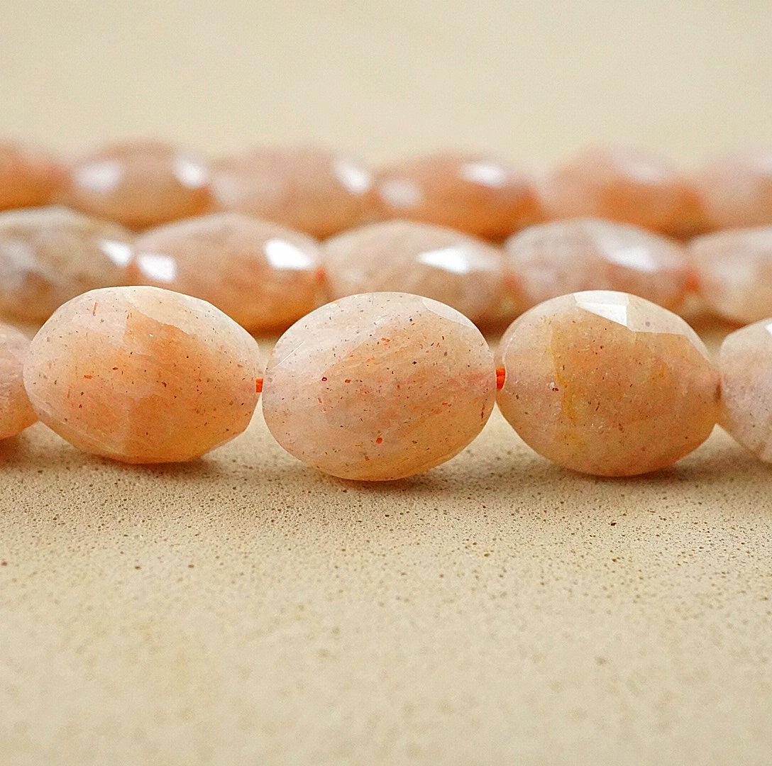 Peach Moonstone (Oval)(Faceted)(8x10mm)(15"Strand)