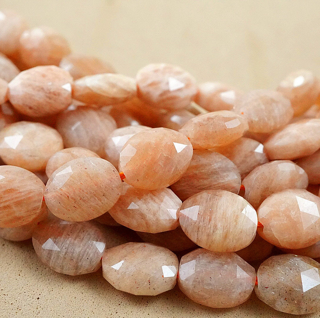 Peach Moonstone (Oval)(Faceted)(8x10mm)(15"Strand)