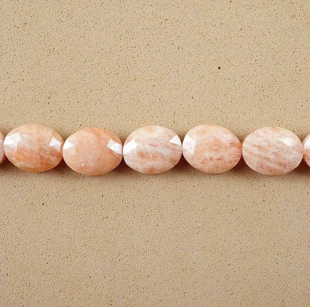 Peach Moonstone (Oval)(Faceted)(8x10mm)(15"Strand)