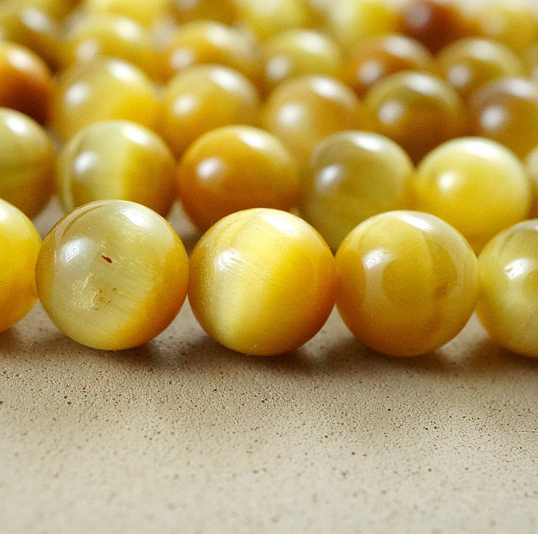 Golden Tiger's Eye (Round)(Smooth)(4mm)(6mm)(8mm)10mm)(12mmm)(16"Strand)