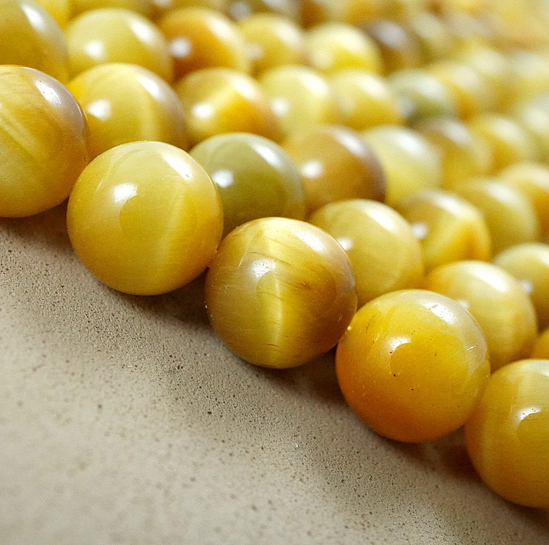 Golden Tiger's Eye (Round)(Smooth)(4mm)(6mm)(8mm)10mm)(12mmm)(16"Strand)
