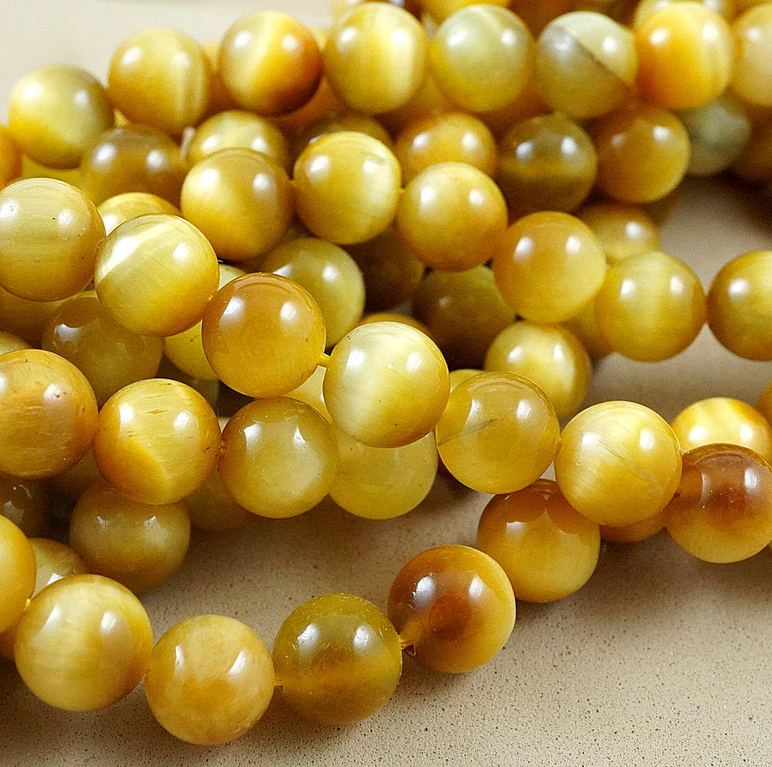 Golden Tiger's Eye (Round)(Smooth)(4mm)(6mm)(8mm)10mm)(12mmm)(16"Strand)