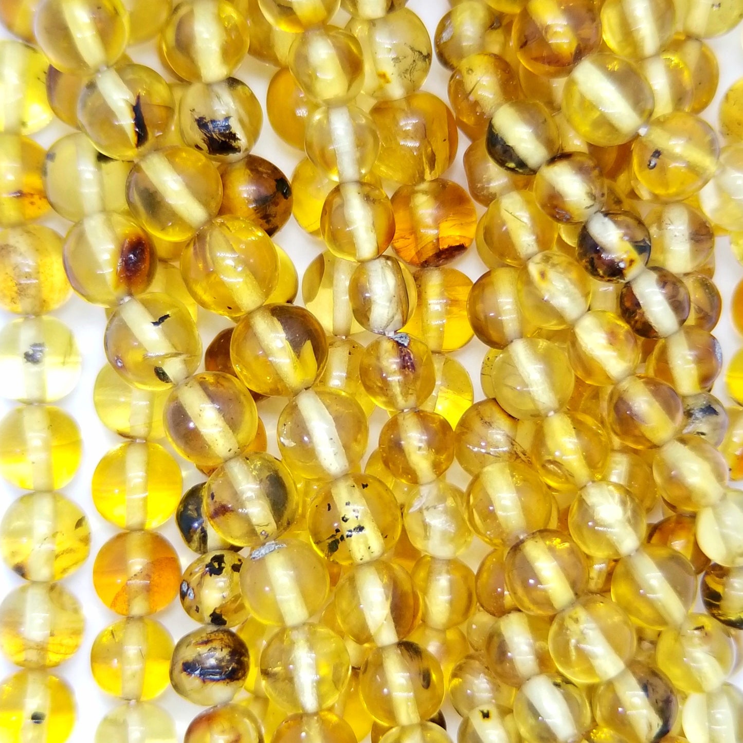 Amber (Round)(Smooth)(Graduated)(A)(20"Strand)