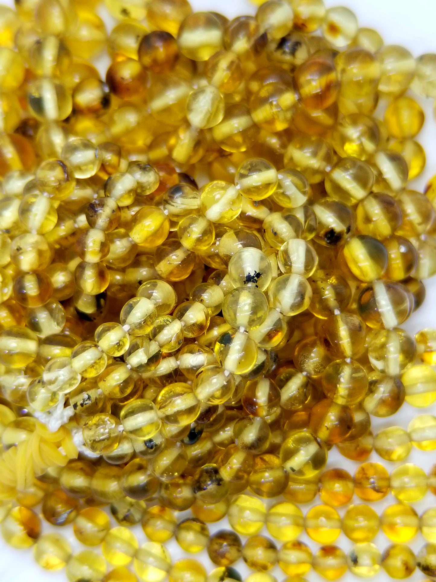 Amber (Round)(Smooth)(Graduated)(A)(20"Strand)