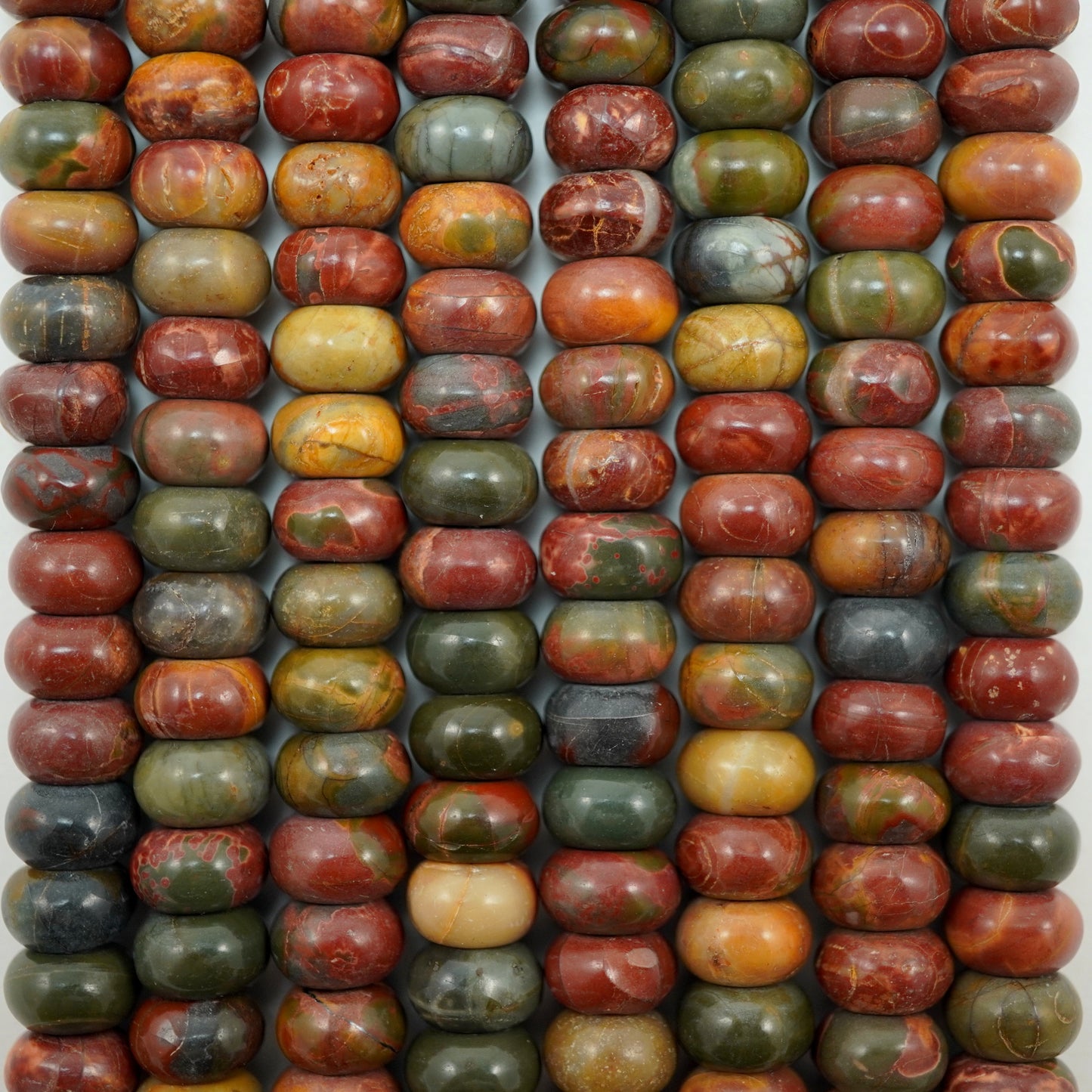 Red Creek Jasper (Rondelle)(Smooth)(6x4mm)(16"Strand)