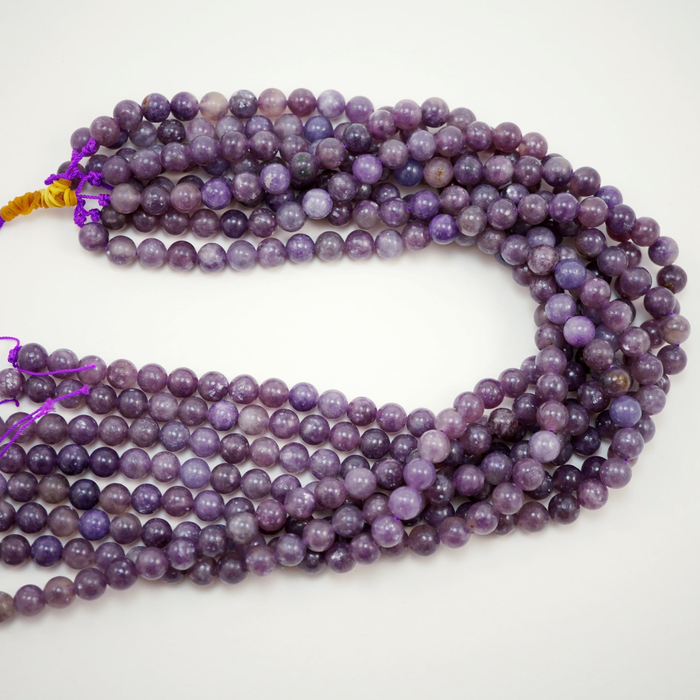 Lepidolite (Round)(Smooth)(4mm)(6mm)(8mm)(10mm)(16"Strand)