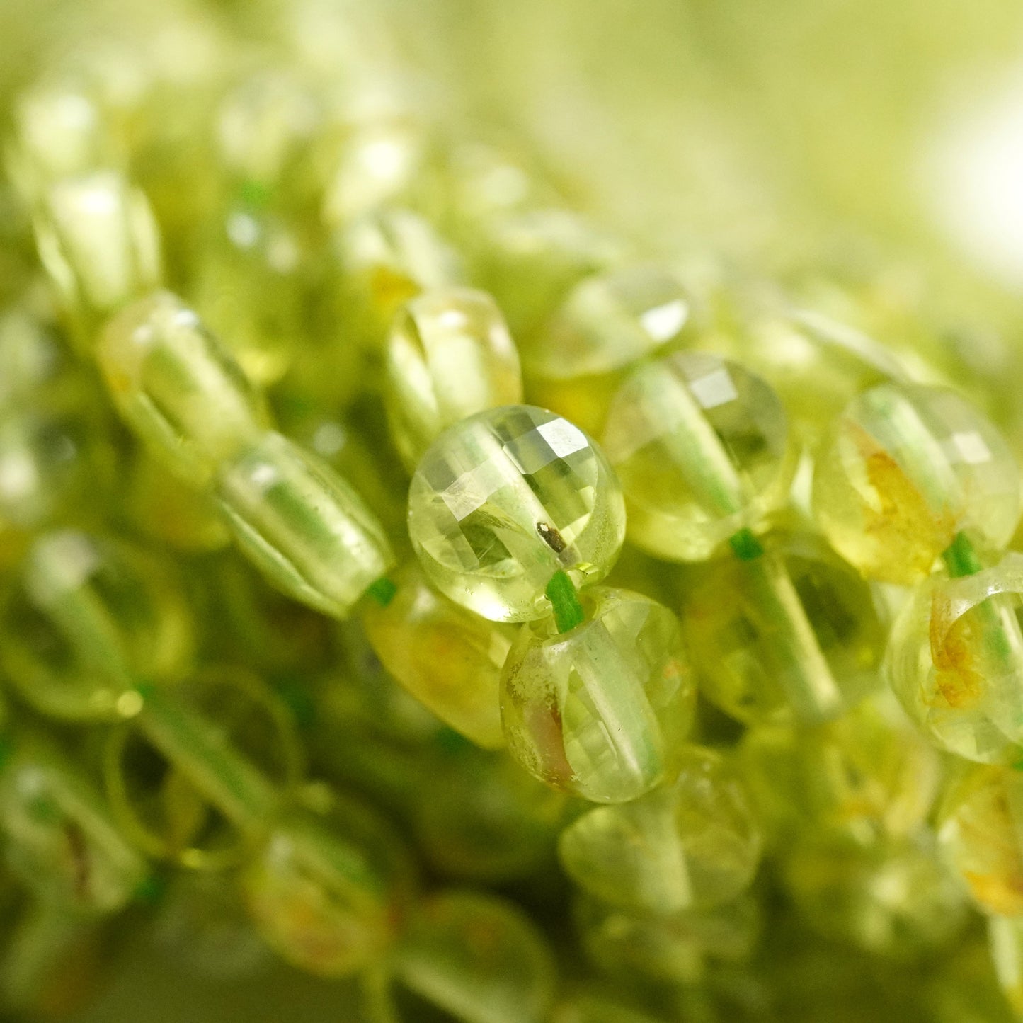 Peridot (Coin)(Micro)(Faceted)(4×2mm)(15.5"Strand)