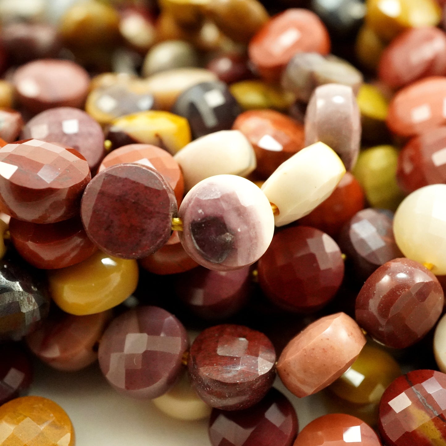 Mookaite (Coin)(Micro)(Faceted)(7×4mm)(15"Strand)