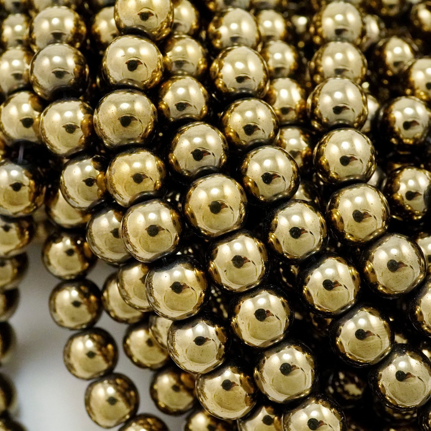 Hematite (Brass)(Electroplated)(Round)(Smooth)(2mm)(4mm)(6mm)(8mm)(10mm)(15.50"Strand)