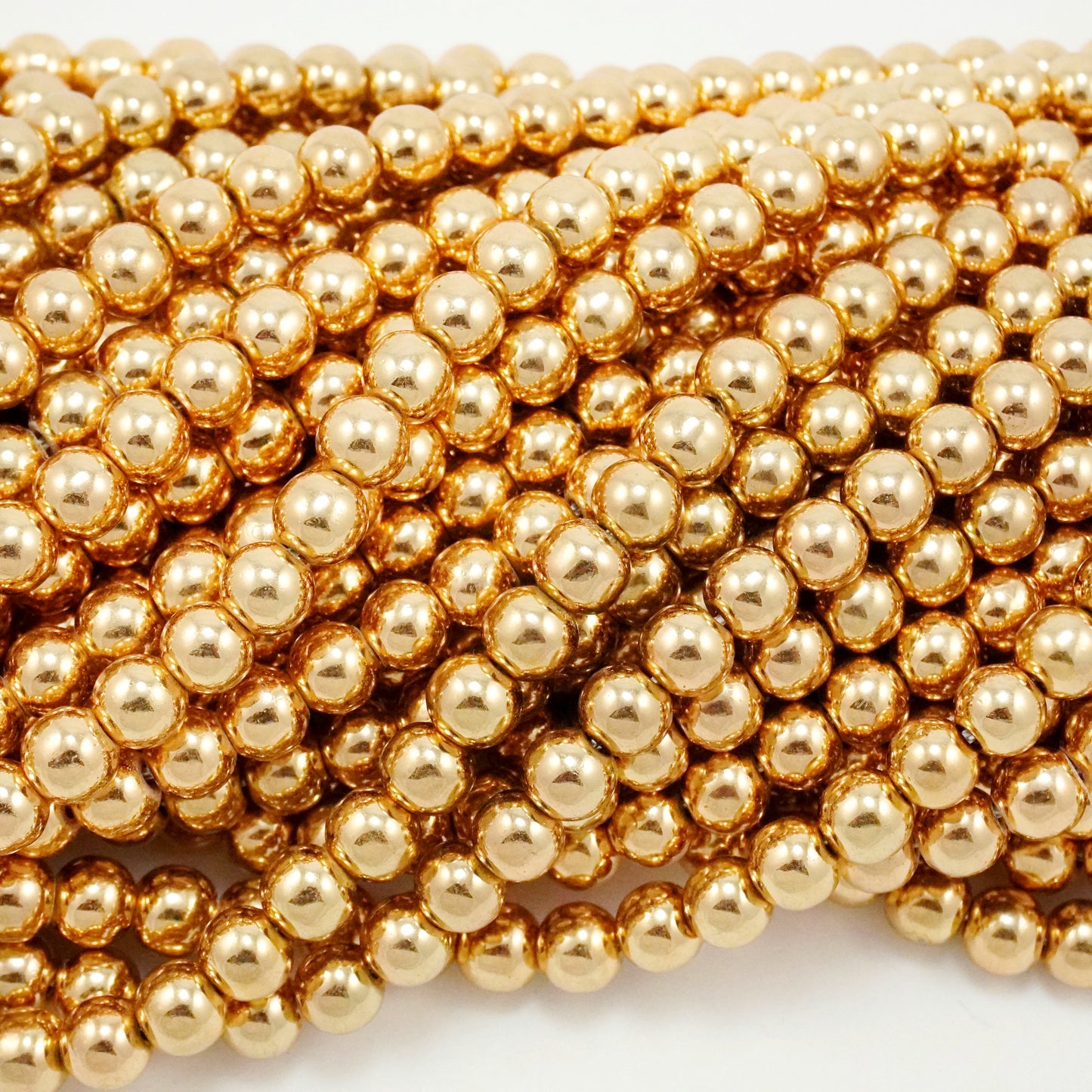 Hematite (Rose Gold)(Electroplated)(Round)(Smooth)(2mm)(4mm)(6mm)(8mm)(15.50"Strand)