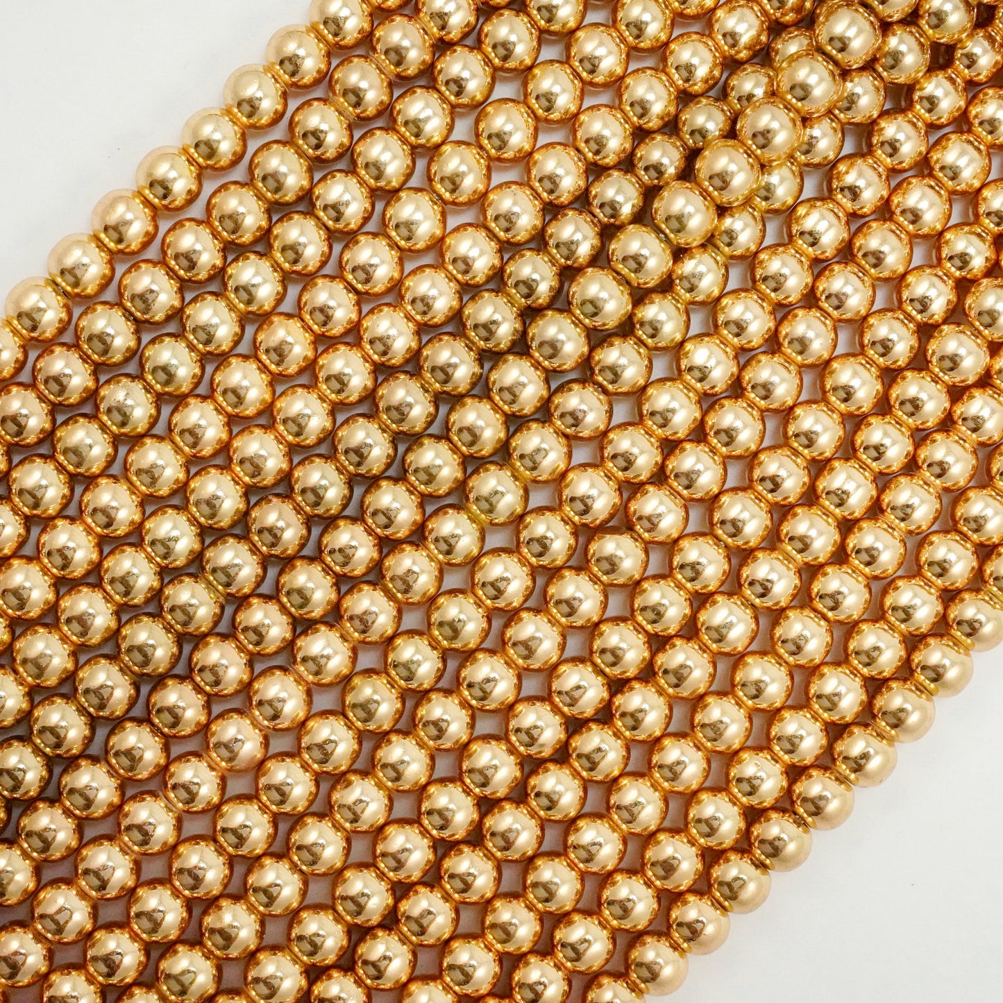 Hematite (Rose Gold)(Electroplated)(Round)(Smooth)(2mm)(4mm)(6mm)(8mm)(15.50"Strand)