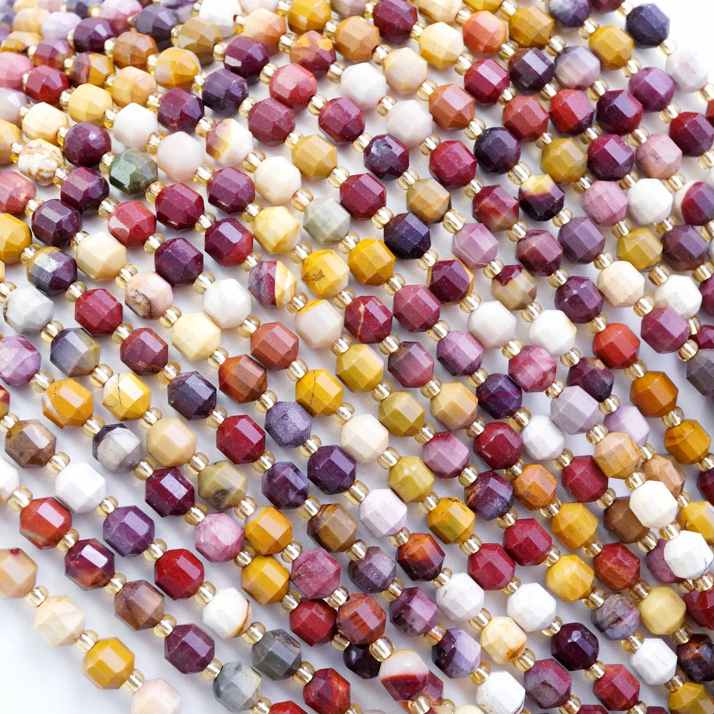 Mookaite (Barrel)(Faceted)(6x5mm)(16"Strand)