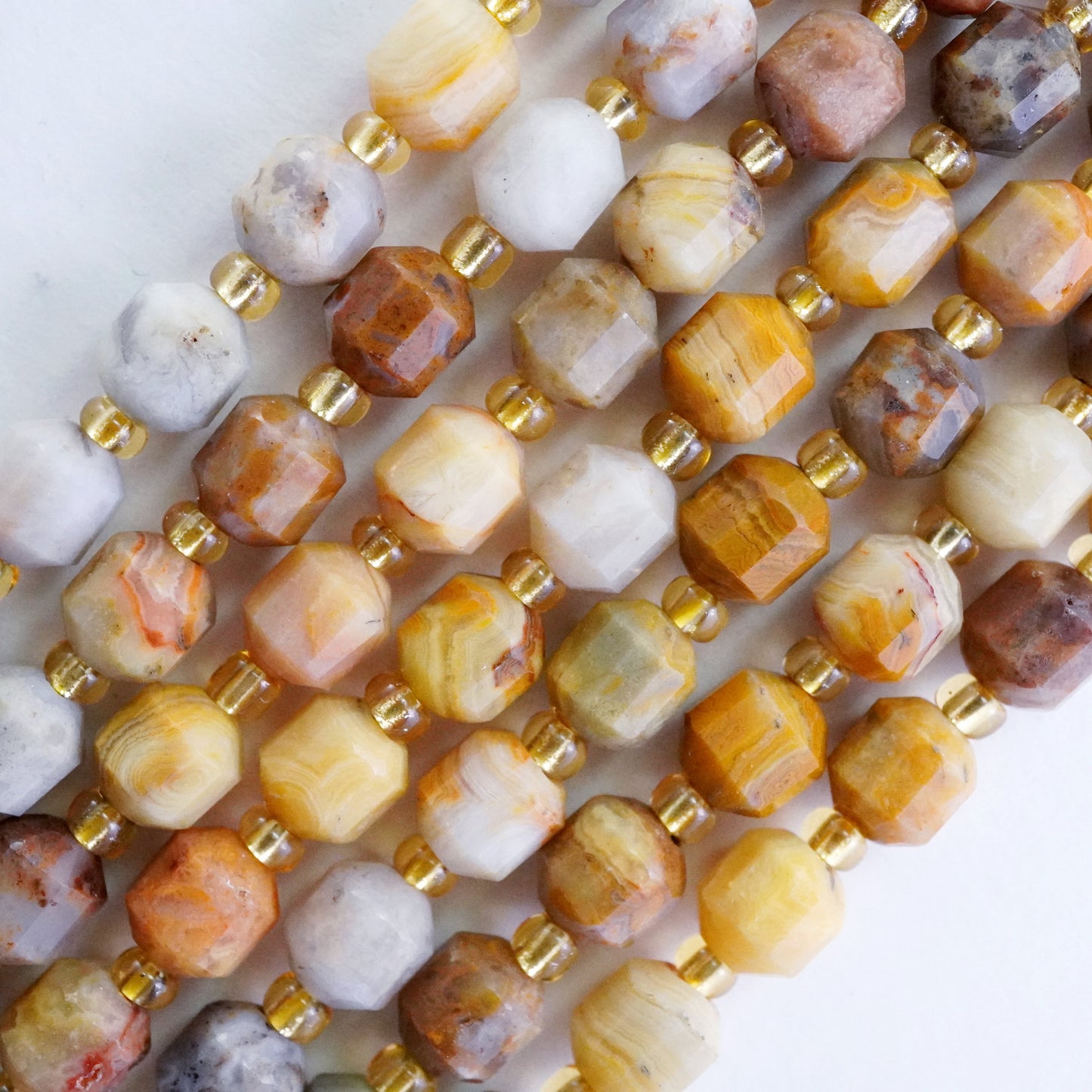 Crazy Lace Agate (Barrel)(Faceted)(6x5mm)(16"Strand)