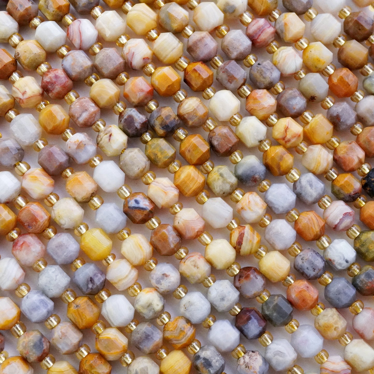 Crazy Lace Agate (Barrel)(Faceted)(6x5mm)(16"Strand)