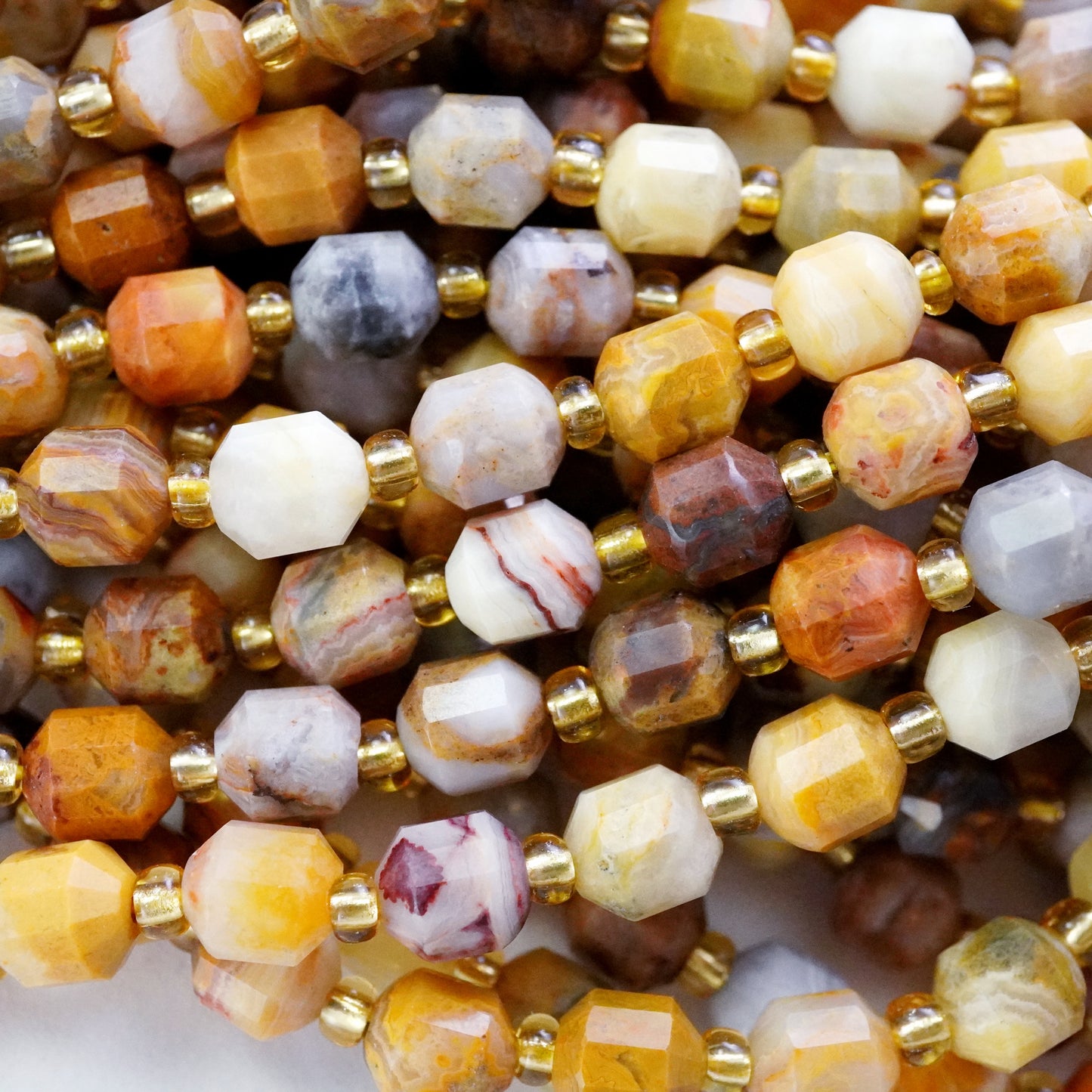 Crazy Lace Agate (Barrel)(Faceted)(6x5mm)(16"Strand)