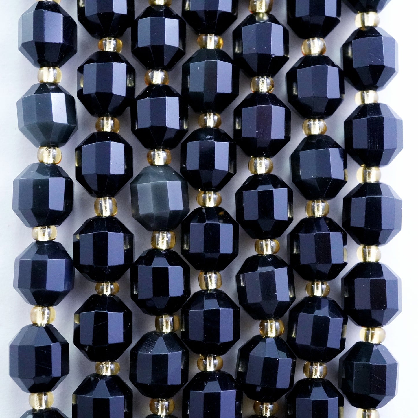 Rainbow Obsidian (Barrel)(Faceted)(8x7mm)(16"Strand)