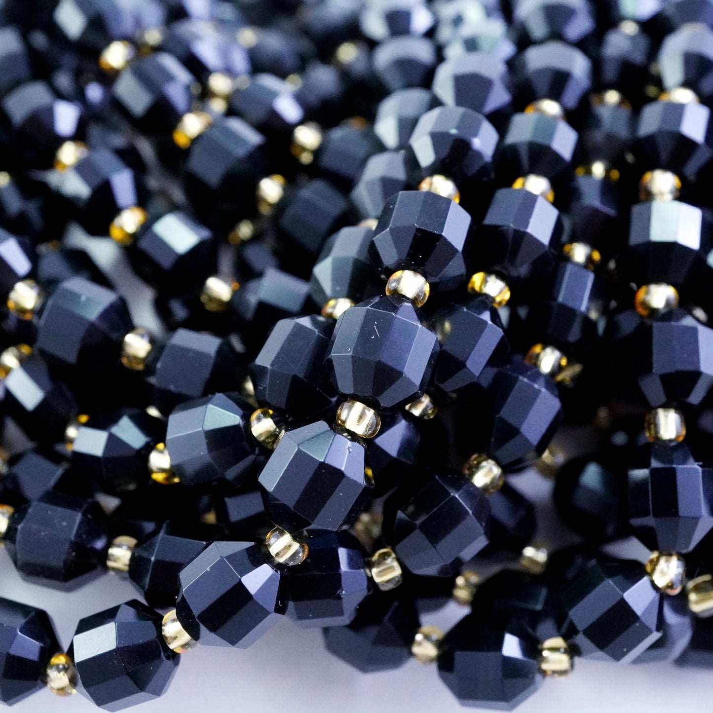 Rainbow Obsidian (Barrel)(Faceted)(8x7mm)(16"Strand)