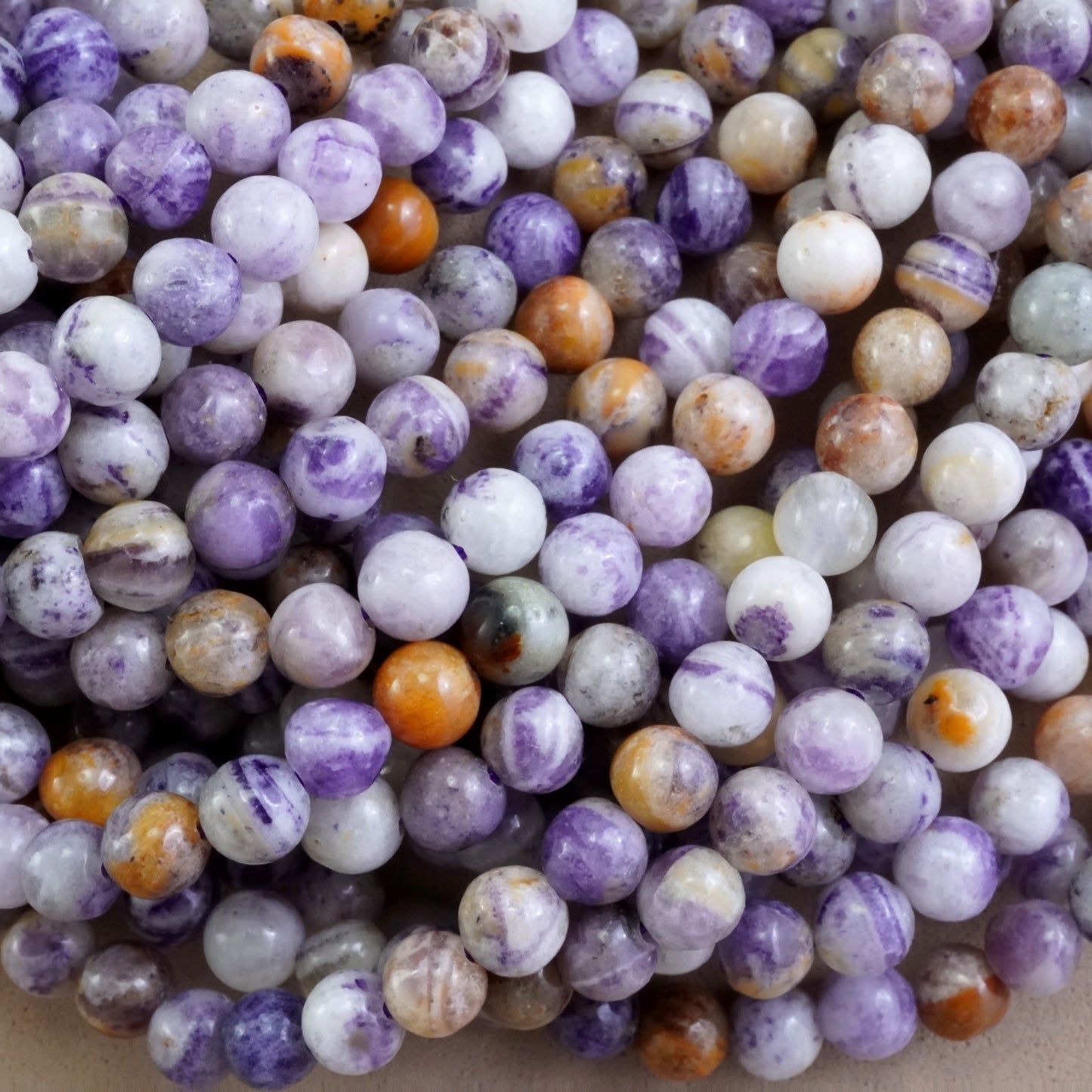 Purple Flower Jasper (Round)(Smooth)(4mm)(6mm)(16"Strand)