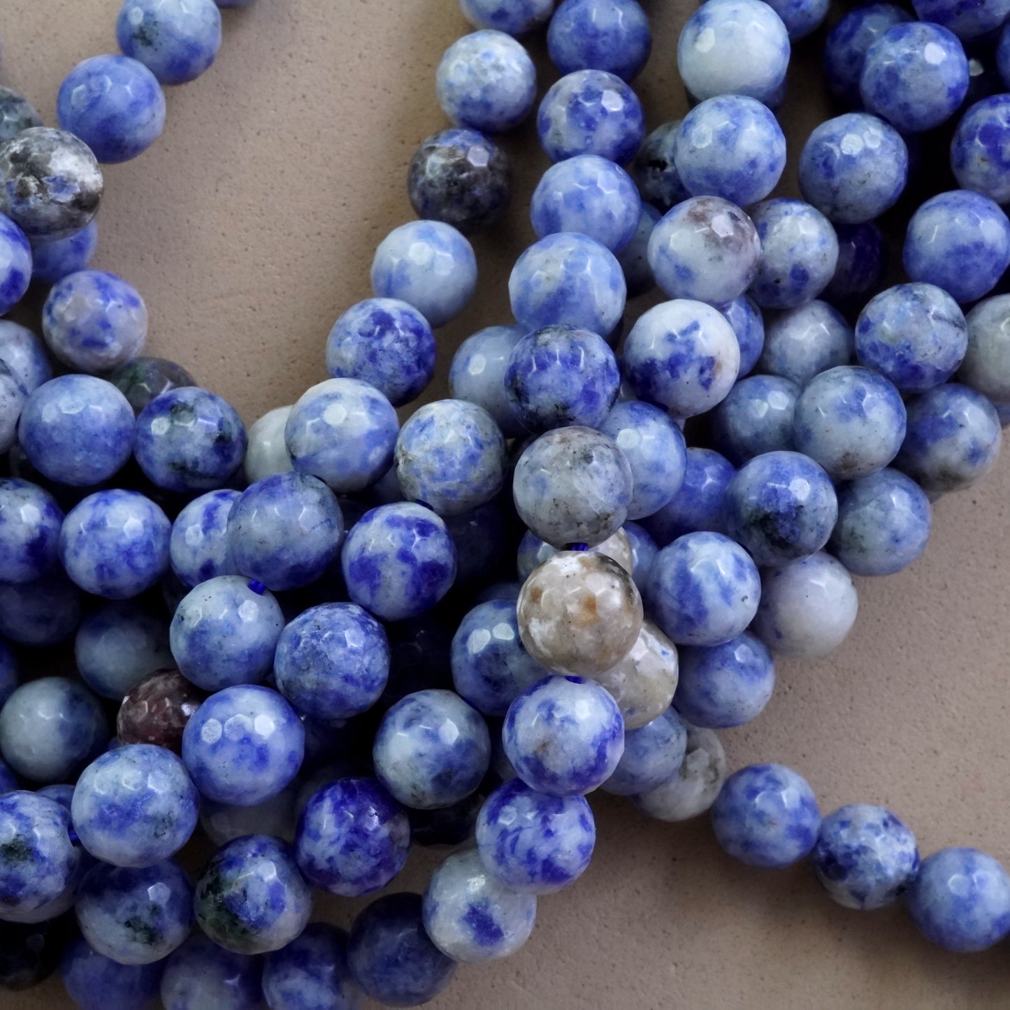 Light Sodalite (Round)(Faceted)(4mm)(6mm)(8mm)(10mm)(16"Strand)