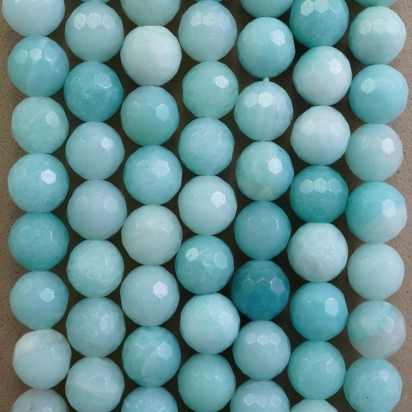 Amazonite (Round)(Faceted)(4mm)(6mm)(8mm)(10mm)(16"Strand)
