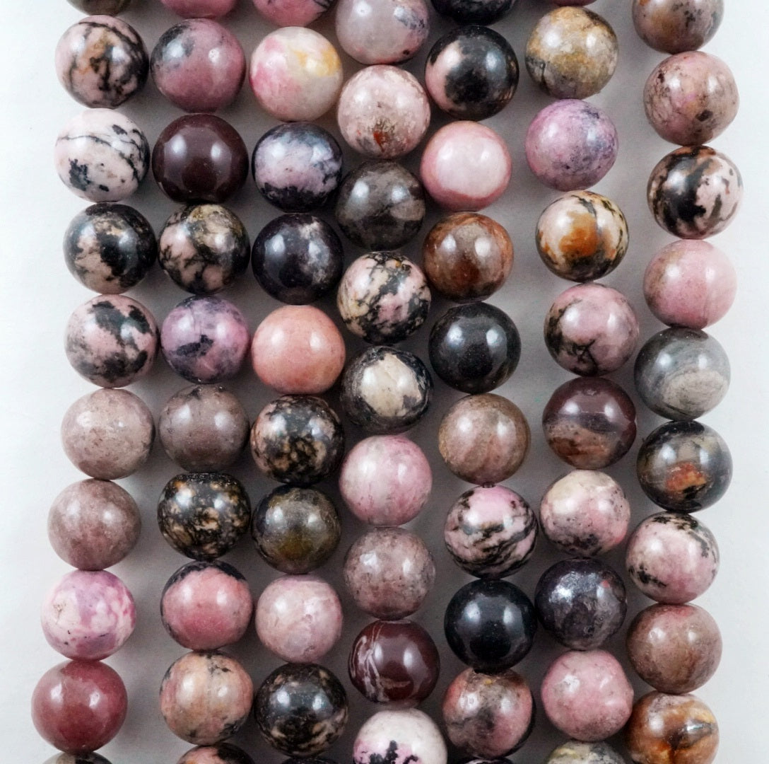 Rhodonite (Round)(Smooth)(4mm)(6mm)(8mm)(10mm)(12mm)(16"Strand)