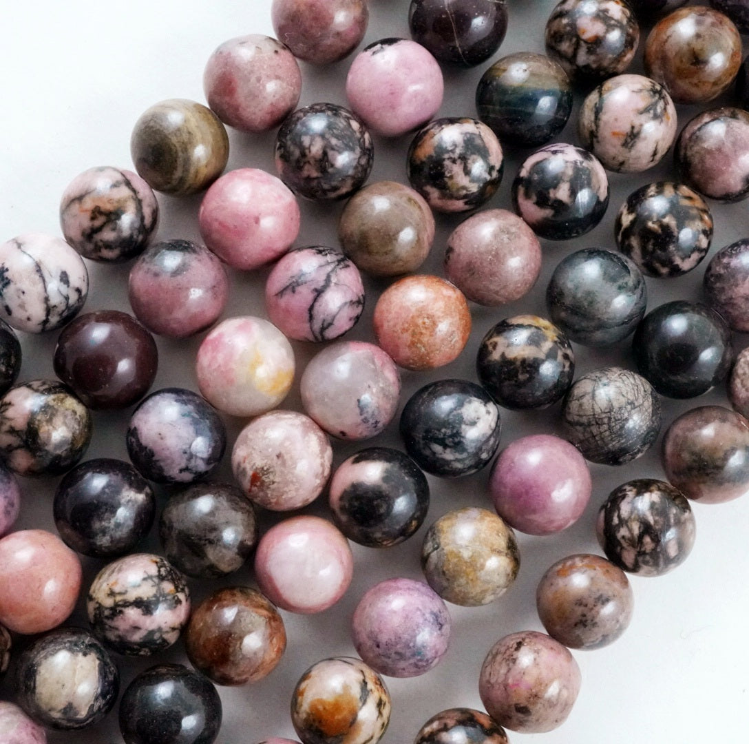 Rhodonite (Round)(Smooth)(4mm)(6mm)(8mm)(10mm)(12mm)(16"Strand)