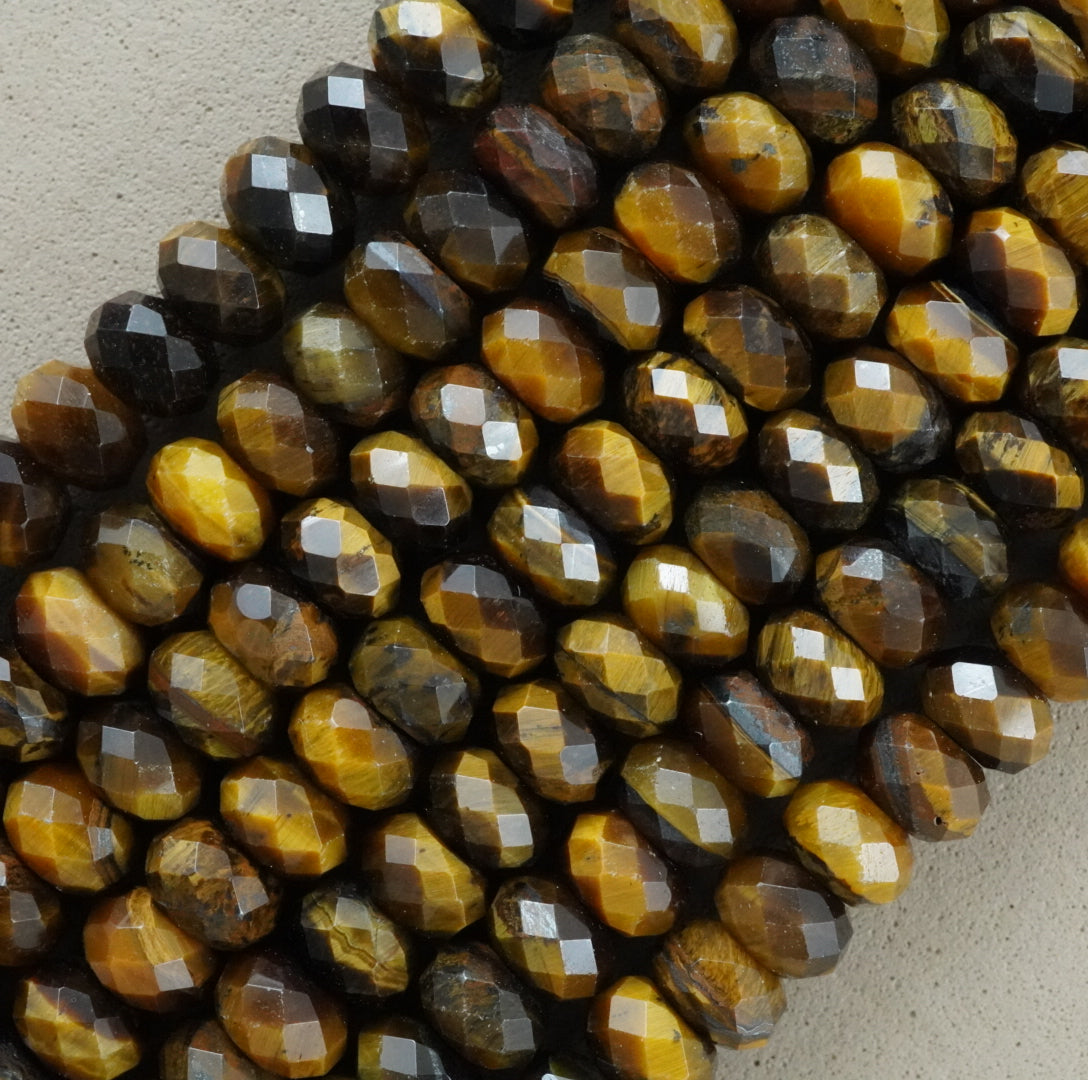 Tiger Eye (Rondelle)(Faceted)(6x4mm)(15.5"Strand)