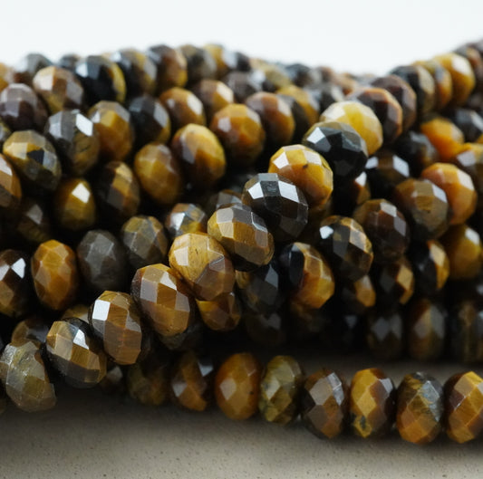 Tiger Eye (Rondelle)(Faceted)(6x4mm)(15.5"Strand)