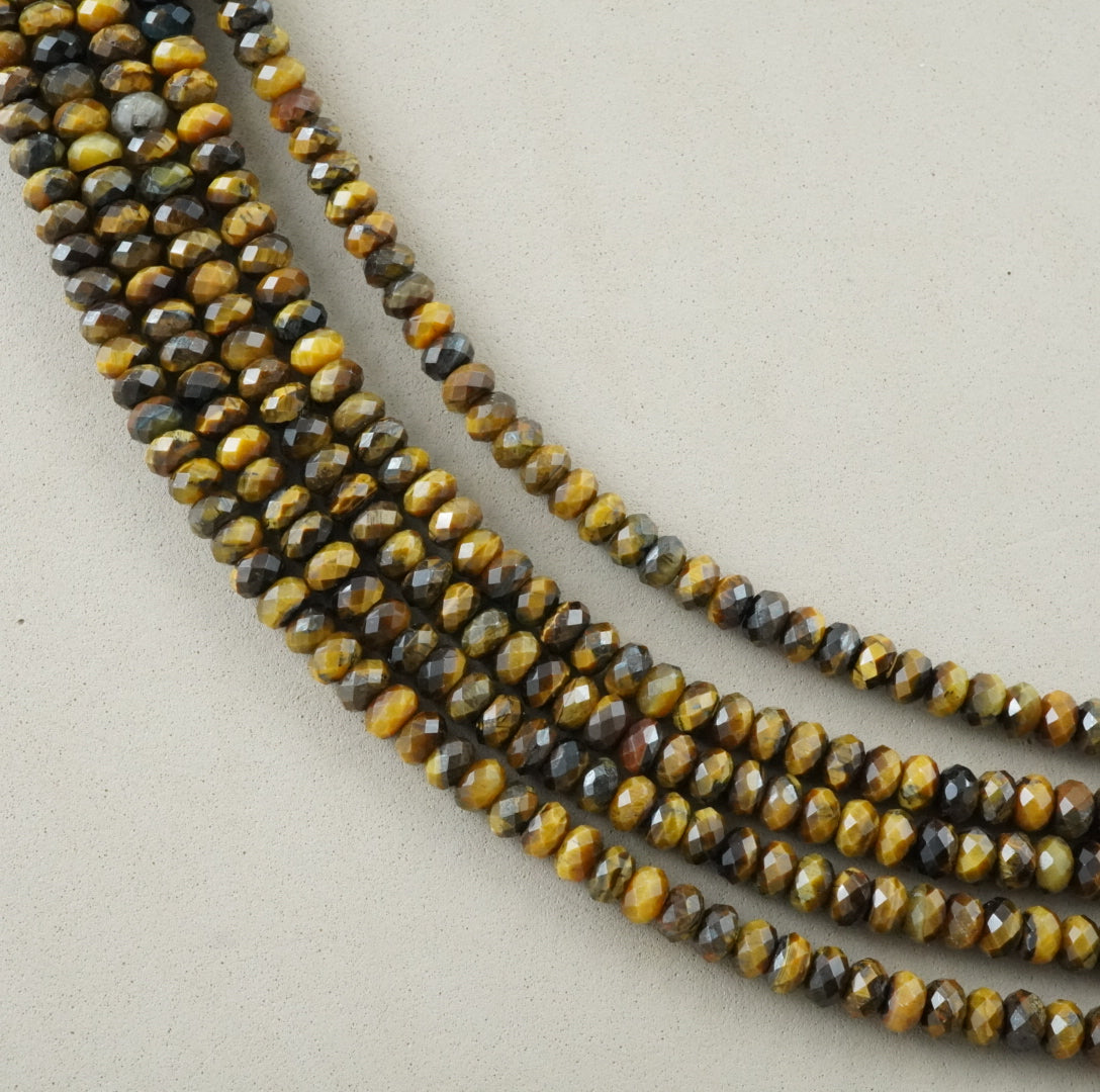 Tiger Eye (Rondelle)(Faceted)(6x4mm)(15.5"Strand)