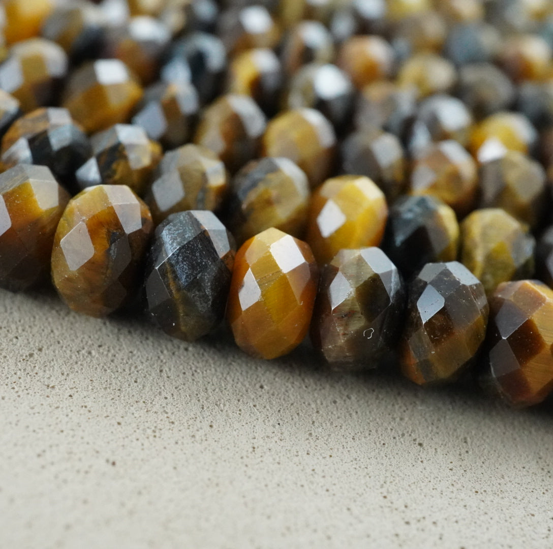 Tiger Eye (Rondelle)(Faceted)(6x4mm)(15.5"Strand)