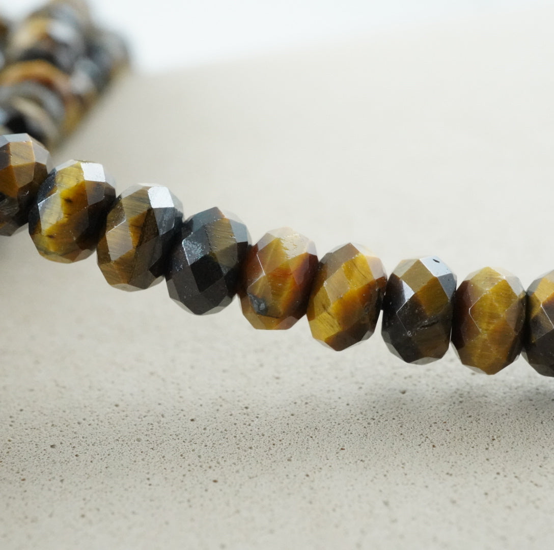 Tiger Eye (Rondelle)(Faceted)(6x4mm)(15.5"Strand)