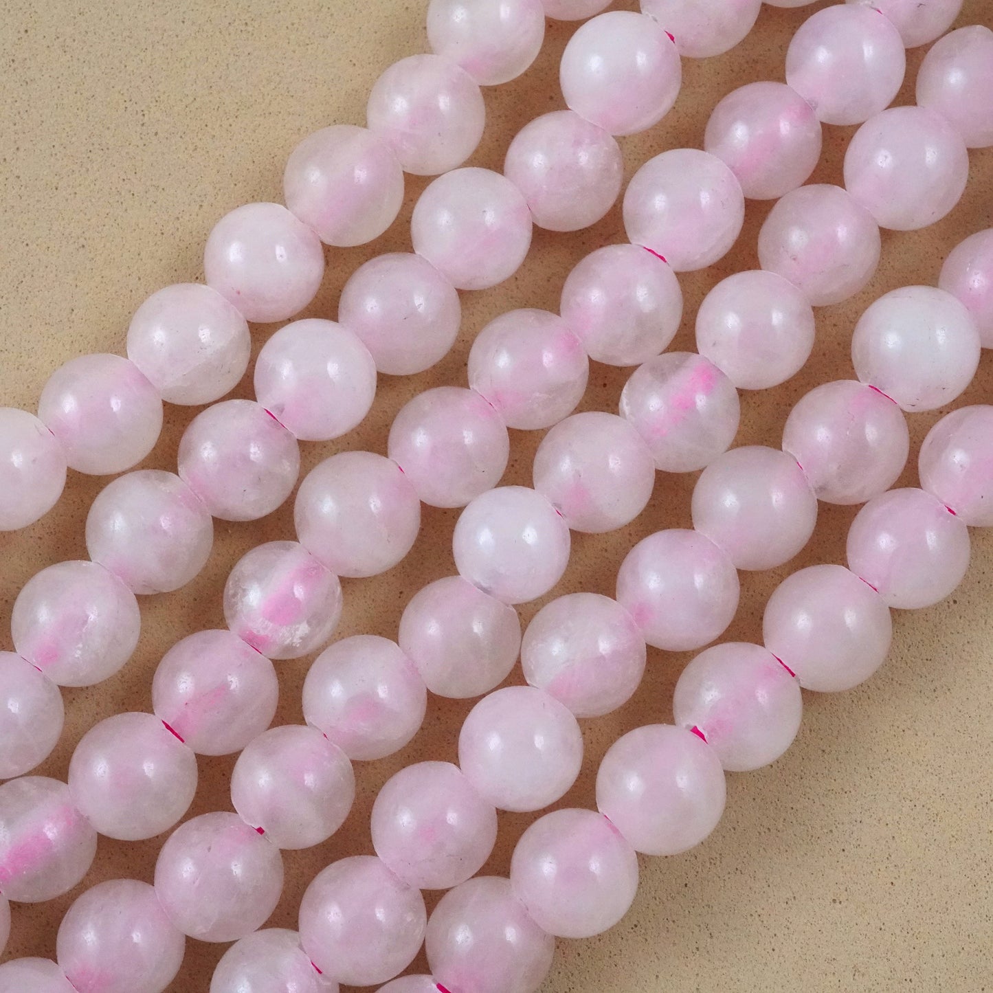Rose Quartz (Large Hole)(Round)(Smooth)(8mm)(10mm)(8"Strand)