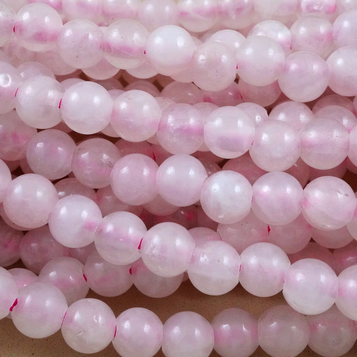 Rose Quartz (Large Hole)(Round)(Smooth)(8mm)(10mm)(8"Strand)