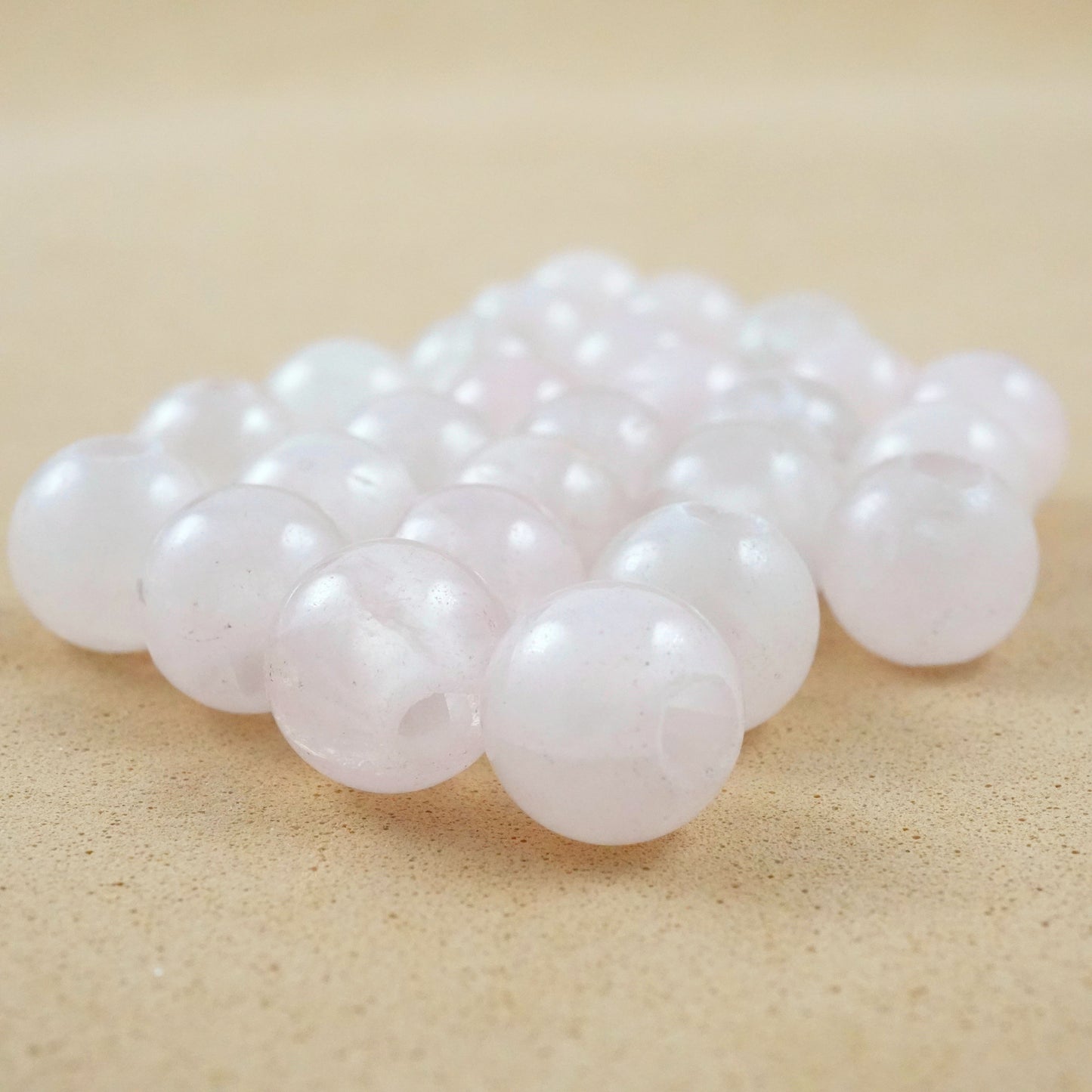 Rose Quartz (Large Hole)(Round)(Smooth)(8mm)(10mm)(8"Strand)