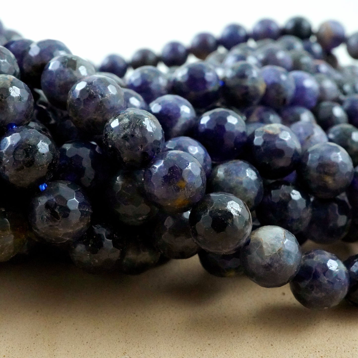 Iolite (Round)(Faceted)(6mm)(8mm)(16"Strand)