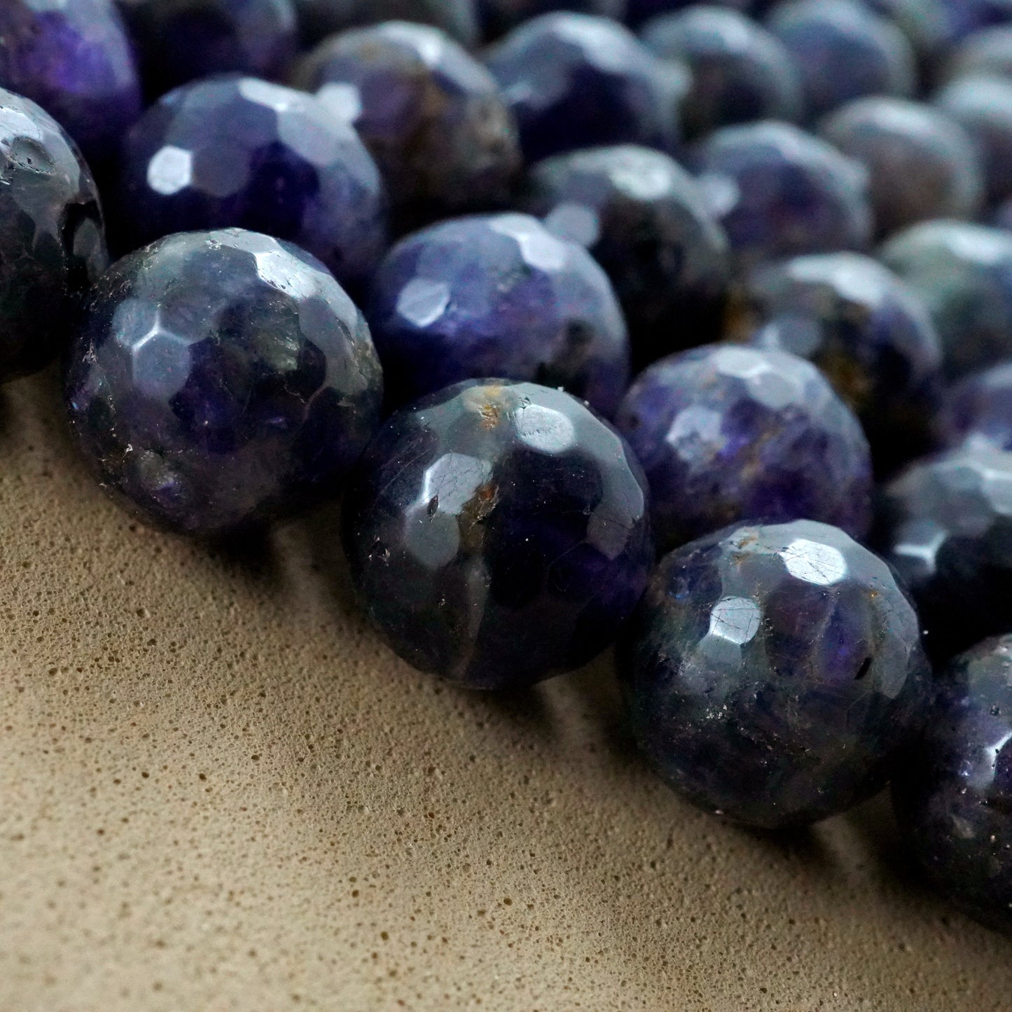 Iolite (Round)(Faceted)(6mm)(8mm)(16"Strand)