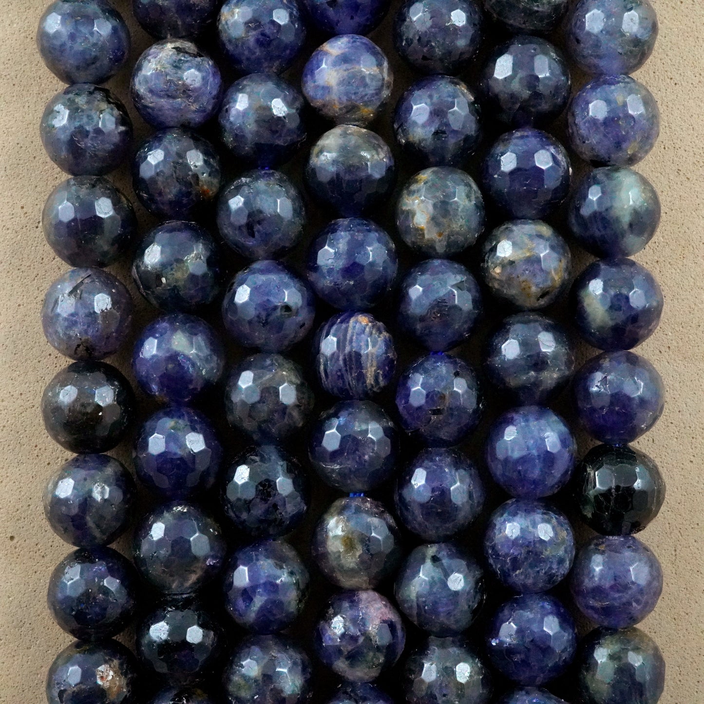 Iolite (Round)(Faceted)(6mm)(8mm)(16"Strand)