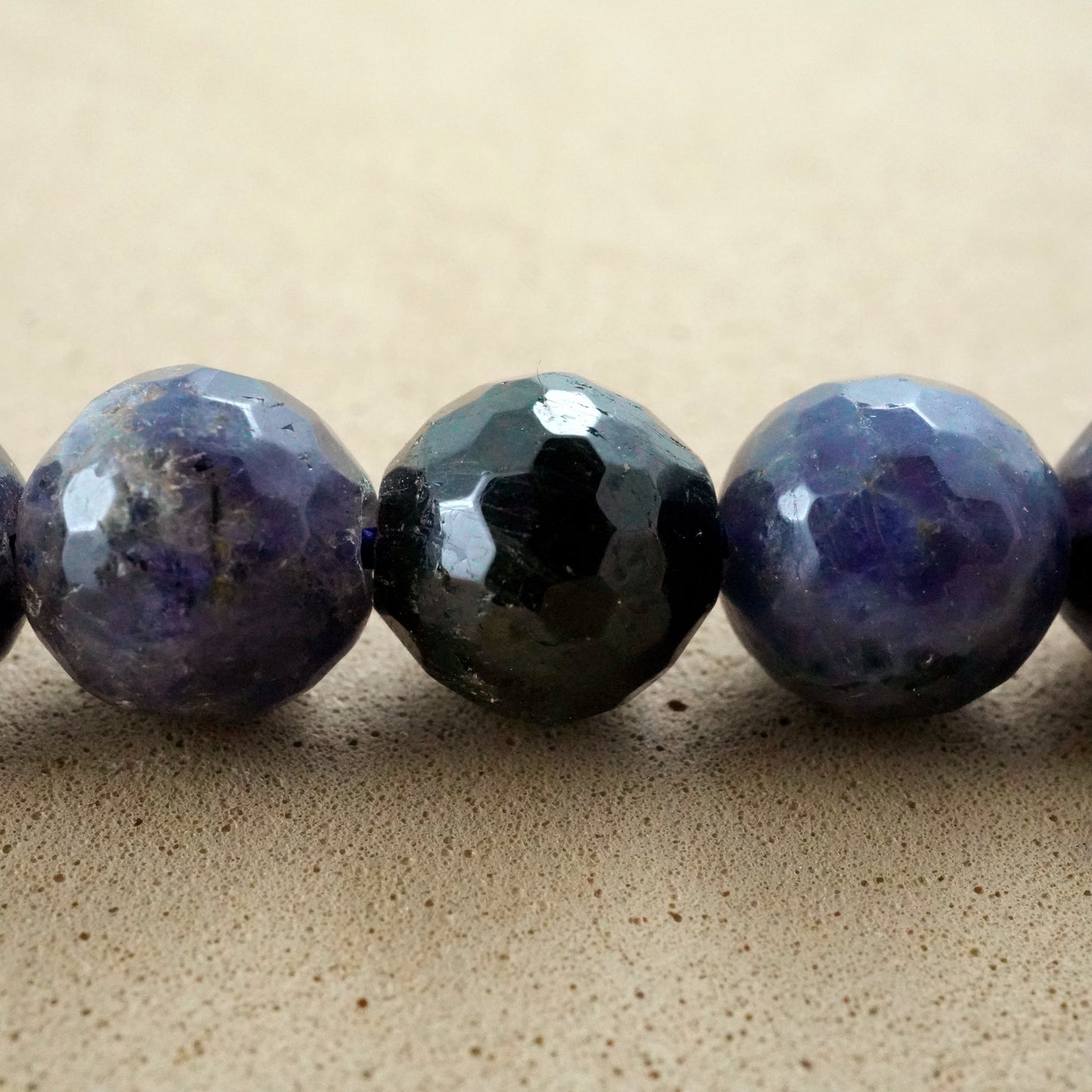 Iolite (Round)(Faceted)(6mm)(8mm)(16"Strand)