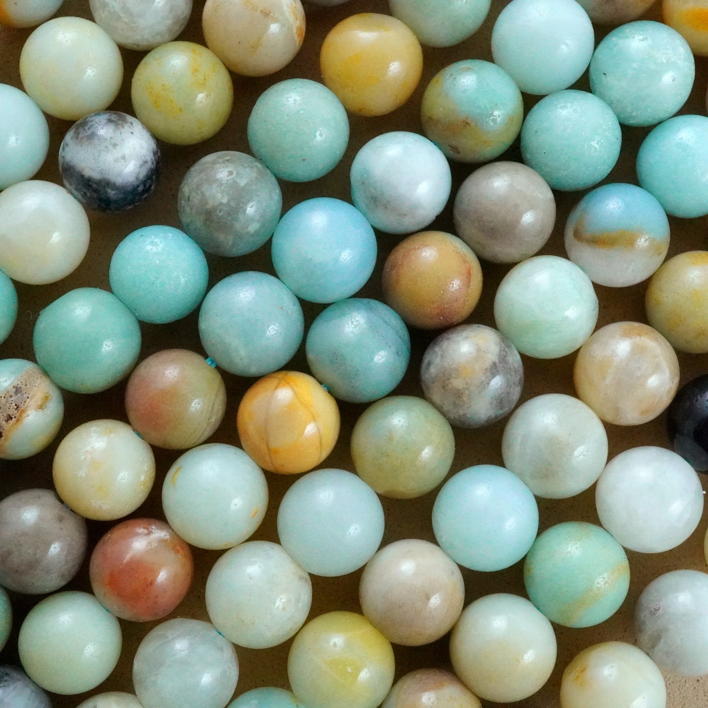 Black Gold Amazonite (Round)(Smooth)(4mm)(6mm)(8mm)(10mm)(12mm)(16" Strand)