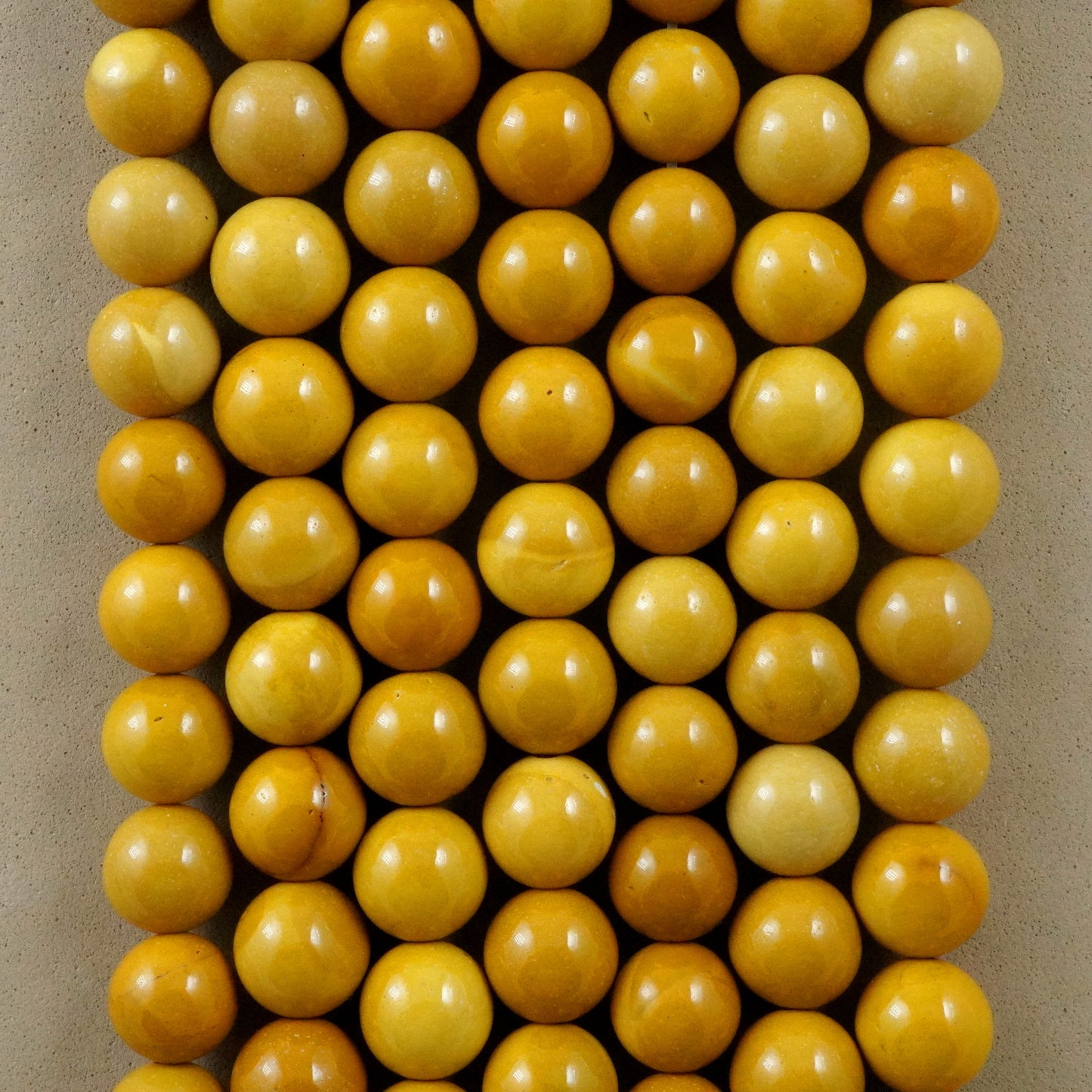 Yellow Mookaite (Round)(Smooth)(4mm)(6mm)(8mm)(10mm)(16"Strand)